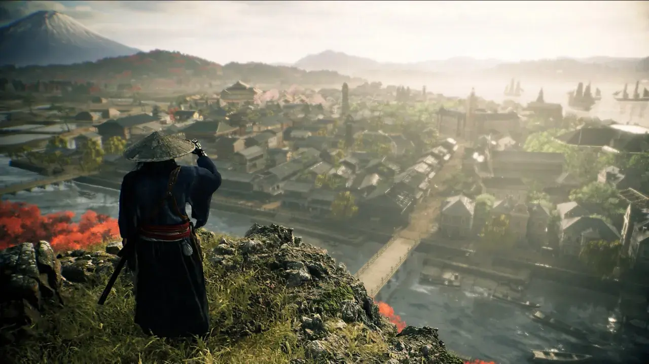 Un samurái observa un pueblo costero con el Monte Fuji al fondo. El **rise of the ronin** se cierne sobre este paisaje.
