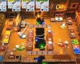 Escena de un juego de cocina para Nintendo Switch. Chefs preparan comida en una cocina caótica con cintas transportadoras y un agujero en el centro.