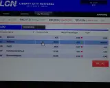 Pantalla de GTA V modo historia. Se muestra el menú de bolsa LCN con acciones como Bullhead y FlyUS. ¡A invertir en bolsa GTA V modo historia!