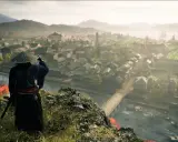 Un samurái observa un pueblo costero con el Monte Fuji al fondo. El **rise of the ronin** se cierne sobre este paisaje.