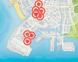 Mapa de Los Santos con círculos rojos marcando ubicaciones para saltos acrobáticos en GTA 5.