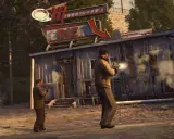 Hombres armados disparan contra un edificio, una escena de acción digna de un juego de mafia en Nintendo Switch.