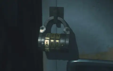 Caja fuerte de combinación en la oficina oeste de Resident Evil 2. Las letras visibles son F, D, N y A, E, O.