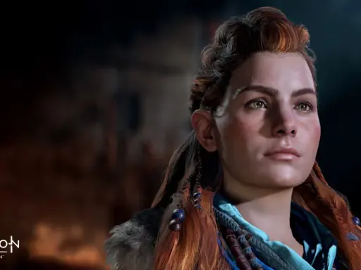 Aloy, protagonista de Horizon Zero Dawn 2, mira al horizonte con determinación. Su cabello pelirrojo trenzado y su mirada penetrante transmiten fuerza.