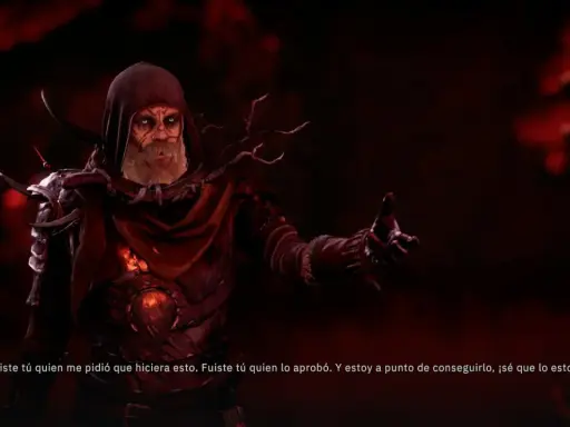 Un hechicero con túnica roja y ojos brillantes, en Tainted Grail: The Fall of Avalon, habla con un gesto amenazante.