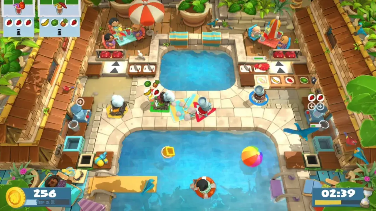 Escena de juegos PS5 2 jugadores misma pantalla: cocinando en una cocina tropical con piscinas, frutas y pájaros.