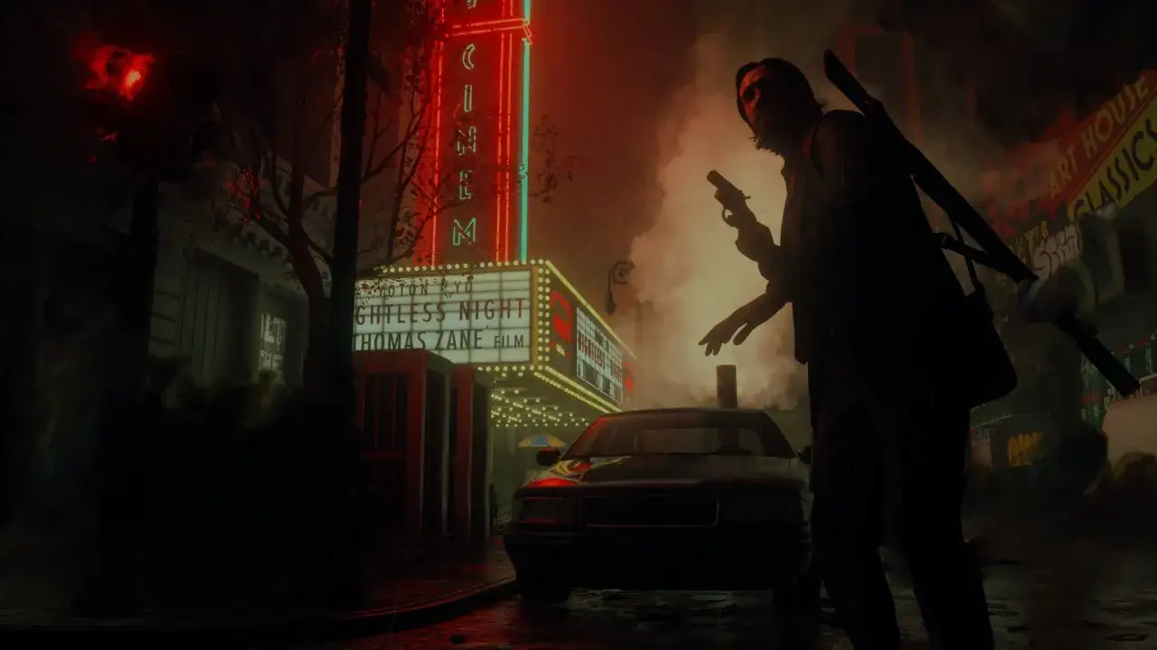 Alan Wake 2: La duración del juego se revela en esta escena nocturna con un cine, un coche y un hombre armado.